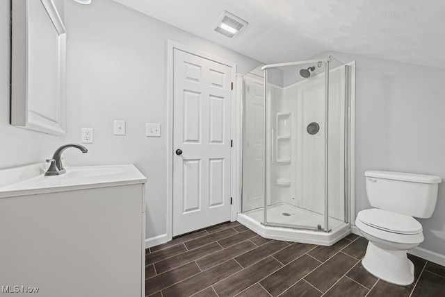 2515 Saratoga Ave SW, Canton, OH 44706 - bathroom with vanity, a shower stall, and wood finish floors