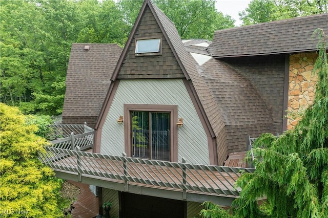 265 Schneiders Crossing Rd NW, Dover, OH 44622 - back of property with a shingled roof and stone siding