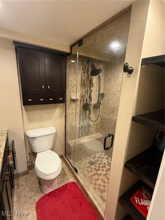 213 Highland Park, Bloomingdale, OH 43910 - bathroom with tile patterned flooring, a stall shower, and vanity