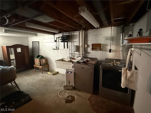 213 Highland Park, Bloomingdale, OH 43910 - unfinished below grade area with washing machine and dryer and a sink