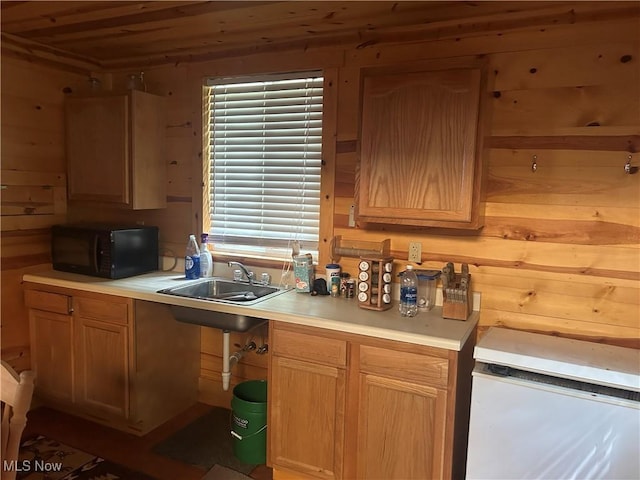61342 High Hill Rd, Cambridge, OH 43725 - kitchen with black microwave, light countertops, refrigerator, and wooden walls
