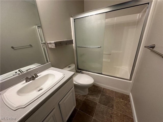 5330 Willow Ln, Sheffield Lake, OH 44054 - bathroom with vanity and bath / shower combo with glass door