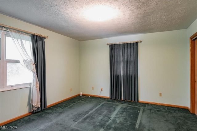 2691 State Route 339, Belpre, OH 45714 - carpeted spare room with a textured ceiling and baseboards