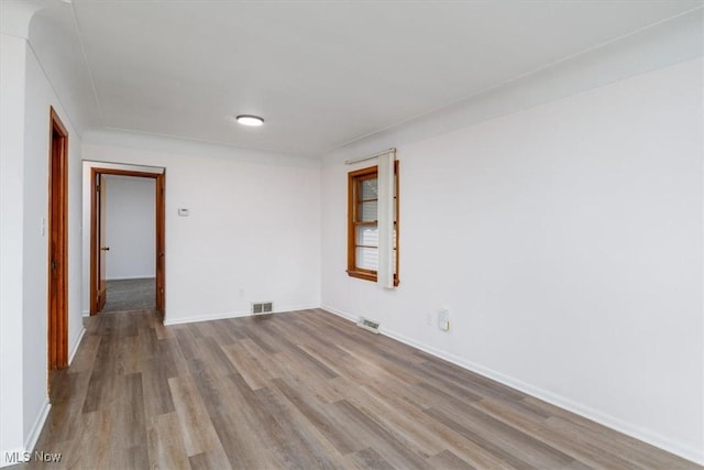 426 E 200th St, Euclid, OH 44119 - spare room with wood finished floors and baseboards