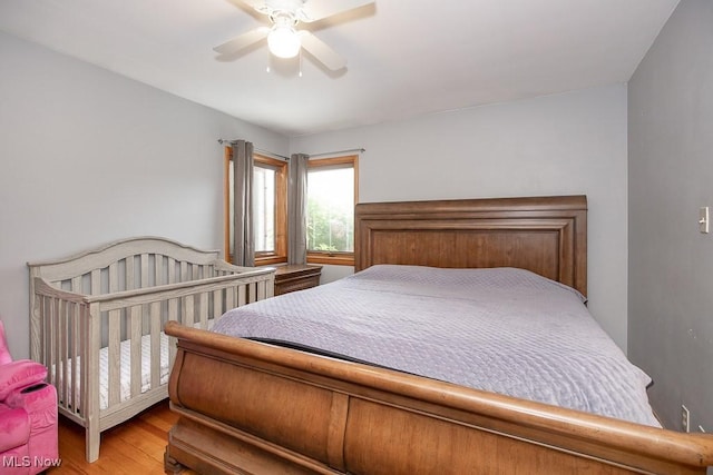 505 Lansing Rd, Akron, OH 44312 - bedroom with wood finished floors and a ceiling fan