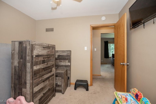 505 Lansing Rd, Akron, OH 44312 - bedroom featuring light colored carpet and a ceiling fan