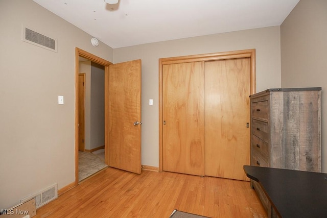 505 Lansing Rd, Akron, OH 44312 - bedroom with light wood-type flooring and a closet