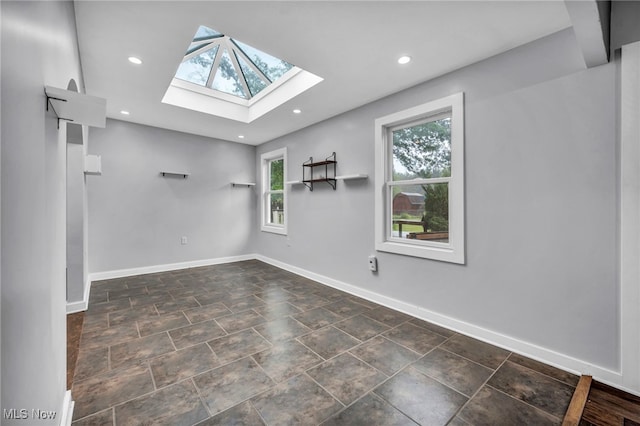 8743 Usher Rd, Olmsted Twp, OH 44138 - spare room with a skylight and recessed lighting