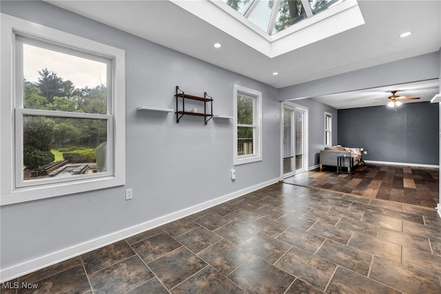 8743 Usher Rd, Olmsted Twp, OH 44138 - spare room featuring a skylight, recessed lighting, and a ceiling fan