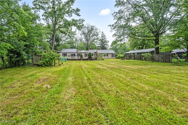 8743 Usher Rd, Olmsted Twp, OH 44138 - view of yard with a deck