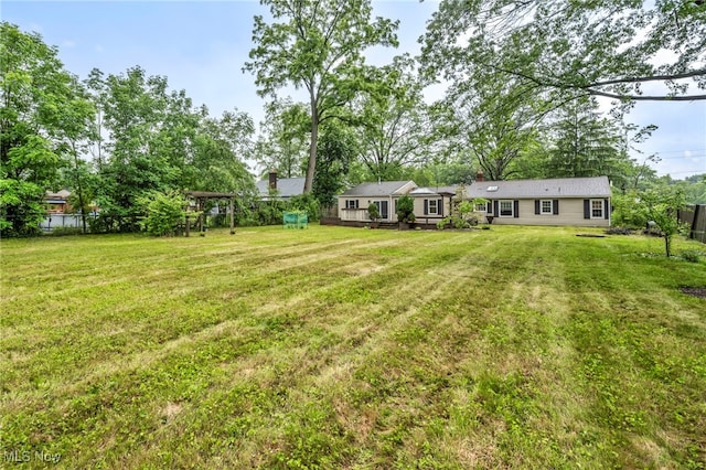 8743 Usher Rd, Olmsted Twp, OH 44138 - view of yard featuring a wooden deck