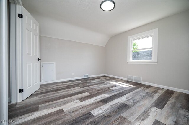 595 Elm St, Struthers, OH 44471 - additional living space with lofted ceiling and wood finished floors