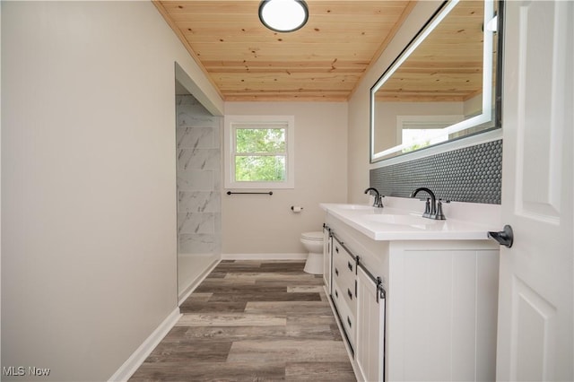 595 Elm St, Struthers, OH 44471 - bathroom featuring wooden ceiling, double vanity, wood finished floors, and a shower