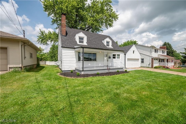 595 Elm St, Struthers, OH 44471 - cape cod-style house featuring a porch, a chimney, concrete driveway, and a shingled roof