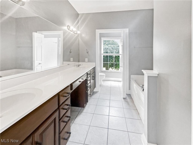 3217 Deborah Ct, Uniontown, OH 44685 - full bathroom with double vanity, a bath, and tile patterned flooring