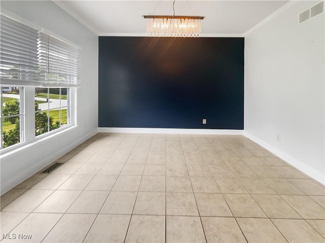 3217 Deborah Ct, Uniontown, OH 44685 - unfurnished room featuring crown molding, a chandelier, and light tile patterned floors