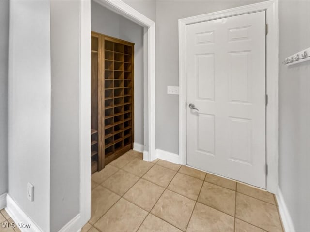 3217 Deborah Ct, Uniontown, OH 44685 - wine room featuring baseboards and light tile patterned floors