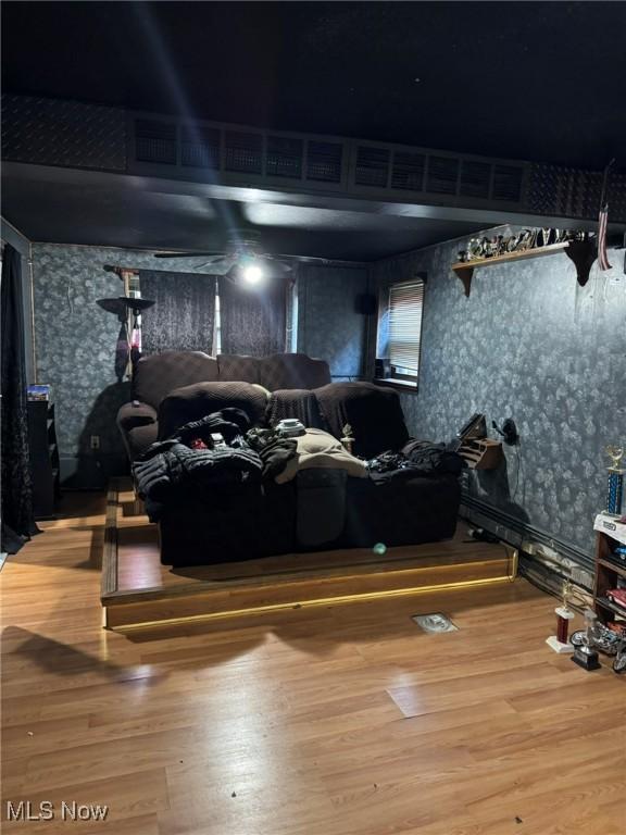 20684 Albion Rd, Strongsville, OH 44149 - living room with wallpapered walls and wood finished floors