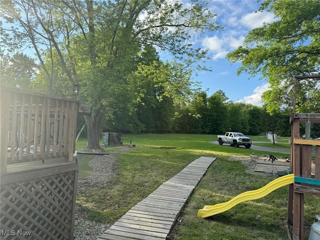 20684 Albion Rd, Strongsville, OH 44149 - view of grassy yard featuring a playground