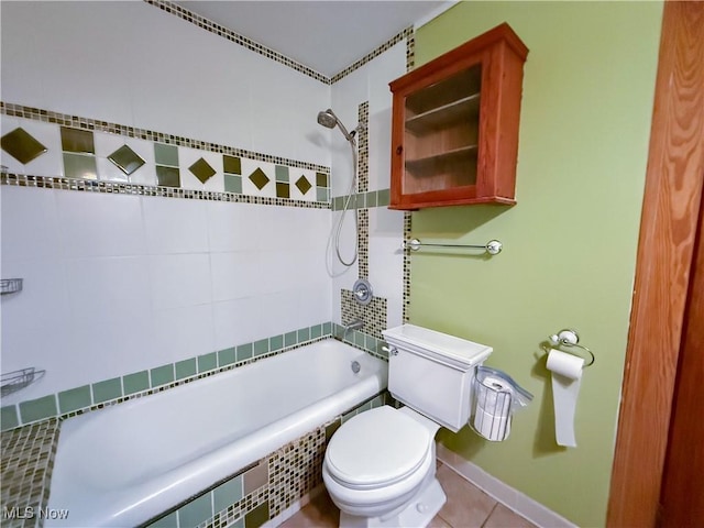 2323 Scholl Rd, University Heights, OH 44118 - full bathroom featuring tile patterned floors and tiled shower / bath combo