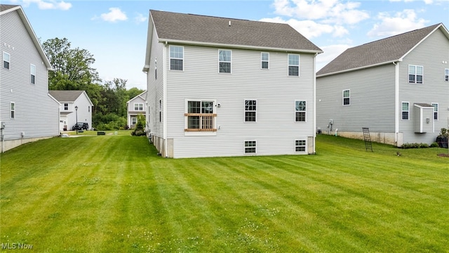 1809 Muirfield Ln, Painesville, OH 44077 - rear view of property with a yard