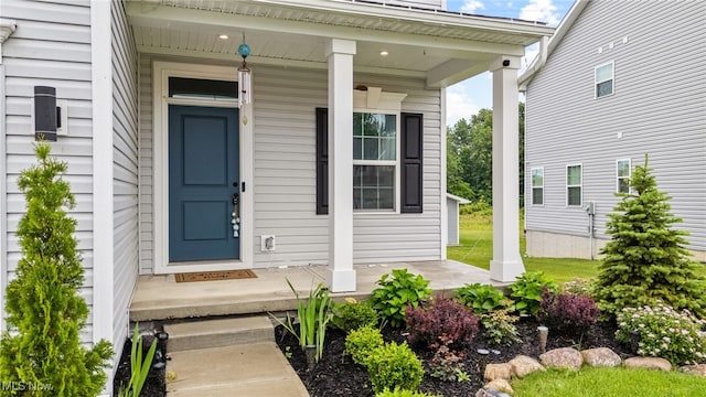 1809 Muirfield Ln, Painesville, OH 44077 - doorway to property featuring covered porch