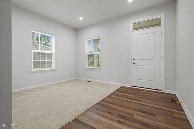 1809 Muirfield Ln, Painesville, OH 44077 - foyer entrance featuring wood finished floors and recessed lighting