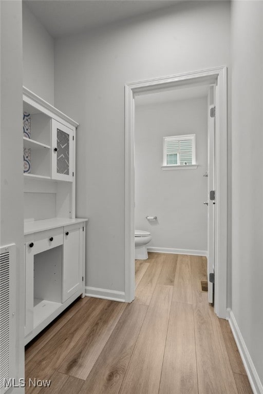 1809 Muirfield Ln, Painesville, OH 44077 - bathroom featuring wood finished floors and toilet