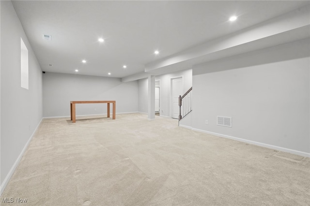1809 Muirfield Ln, Painesville, OH 44077 - finished below grade area with light colored carpet, stairway, and recessed lighting