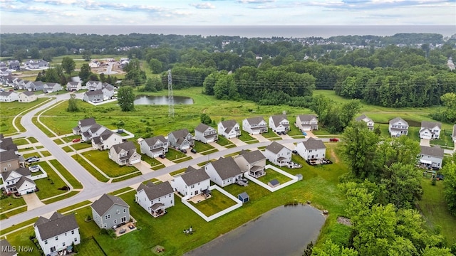 1809 Muirfield Ln, Painesville, OH 44077 - aerial overview of property's location with a nearby body of water and nearby suburban area