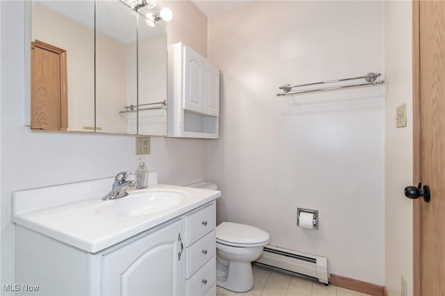 4671 Milford Dr, Perry, OH 44081 - half bath featuring a baseboard radiator, vanity, and tile patterned floors