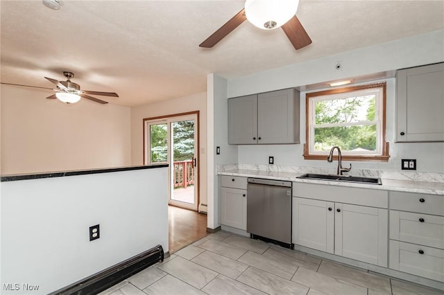 4671 Milford Dr, Perry, OH 44081 - kitchen featuring dishwasher, gray cabinets, ceiling fan, light countertops, and a baseboard heating unit