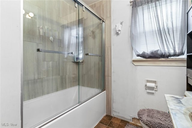 120 Palmetto Ave, Bedford, OH 44146 - bathroom with bath / shower combo with glass door, vanity, and stone finish flooring