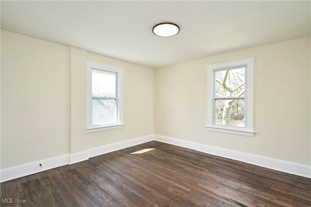 2231 16th St, Cuyahoga Falls, OH 44223 - unfurnished room featuring dark wood-type flooring and baseboards