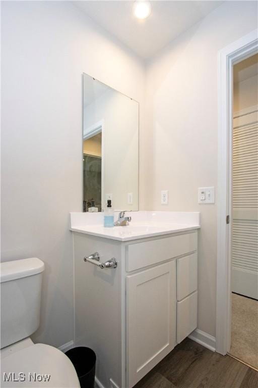 393 Slate Rdg, Barberton, OH 44203 - bathroom featuring vanity and wood finished floors