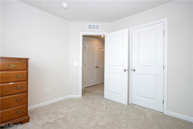 393 Slate Rdg, Barberton, OH 44203 - unfurnished bedroom featuring light colored carpet and baseboards