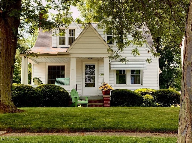 21437 Hillsdale Ave, Fairview Park, OH 44126 - view of front of property with a front lawn