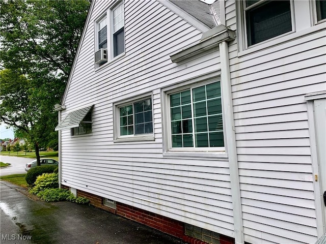 21437 Hillsdale Ave, Fairview Park, OH 44126 - view of home's exterior with crawl space and cooling unit