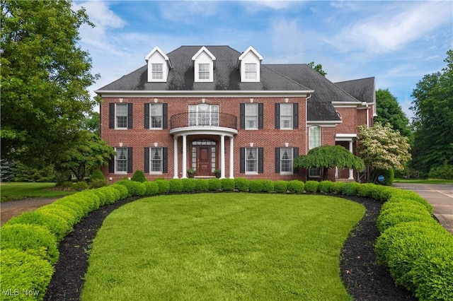 23225 Wingedfoot Dr, Westlake, OH 44145 - colonial home with a front lawn and brick siding