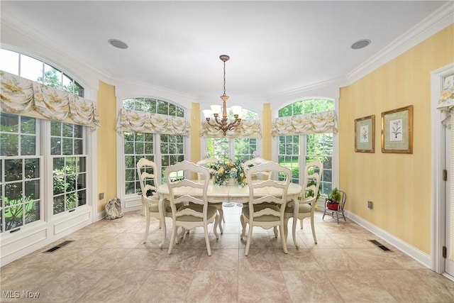 23225 Wingedfoot Dr, Westlake, OH 44145 - dining space featuring crown molding and a chandelier