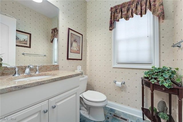 23225 Wingedfoot Dr, Westlake, OH 44145 - bathroom with wallpapered walls and vanity