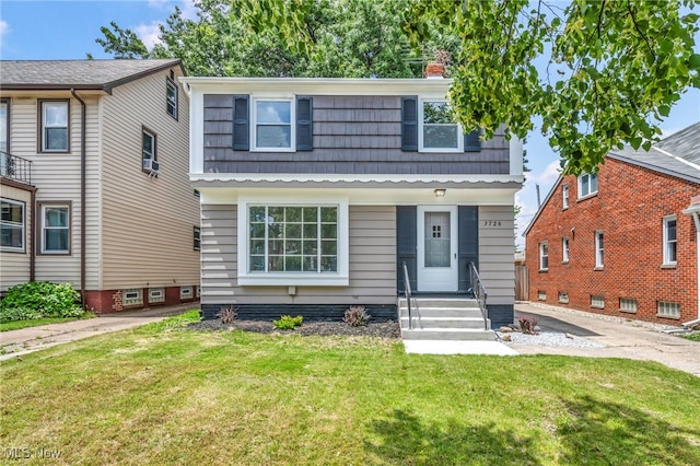 3726 W 169th St, Cleveland, OH 44111 - view of front of house with a front lawn and a chimney