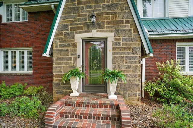 3571 Greenwich Rd, Barberton, OH 44203 - doorway to property with brick siding and a metal roof