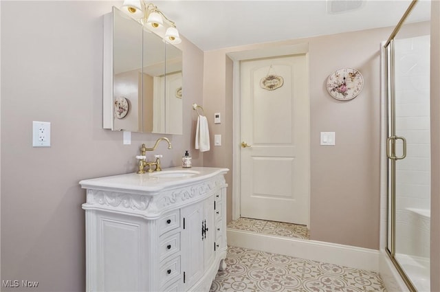 3571 Greenwich Rd, Barberton, OH 44203 - bathroom featuring a shower with shower door, vanity, and tile patterned floors