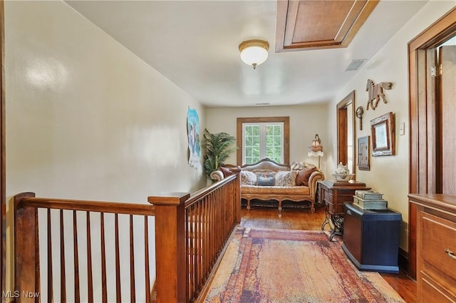 3571 Greenwich Rd, Barberton, OH 44203 - hallway featuring wood finished floors and an upstairs landing