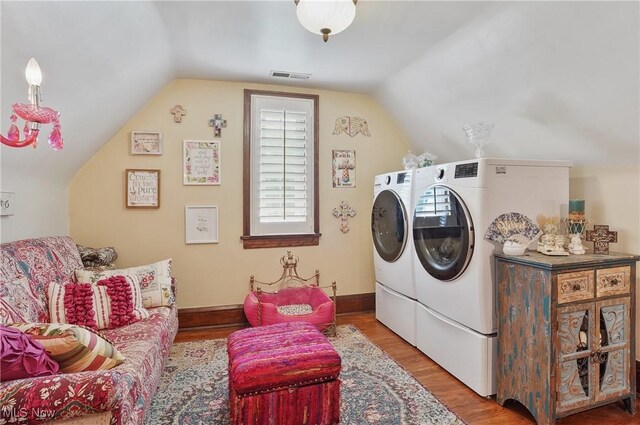 3571 Greenwich Rd, Barberton, OH 44203 - laundry room with washing machine and dryer and wood finished floors