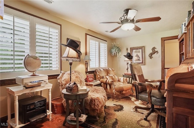 3571 Greenwich Rd, Barberton, OH 44203 - living area featuring ceiling fan and plenty of natural light