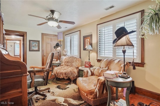 3571 Greenwich Rd, Barberton, OH 44203 - living area with ceiling fan and wood finished floors