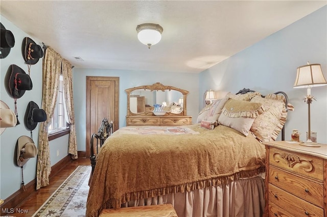 3571 Greenwich Rd, Barberton, OH 44203 - bedroom with dark wood finished floors and baseboards