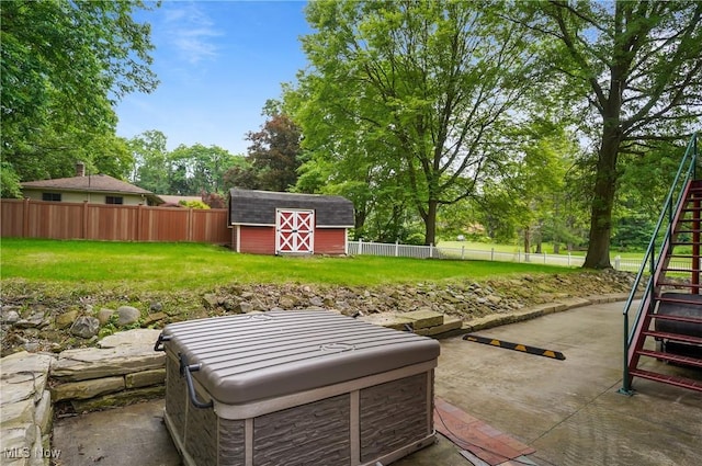 3571 Greenwich Rd, Barberton, OH 44203 - fenced backyard with stairs, a storage unit, a patio area, and view of wooded area